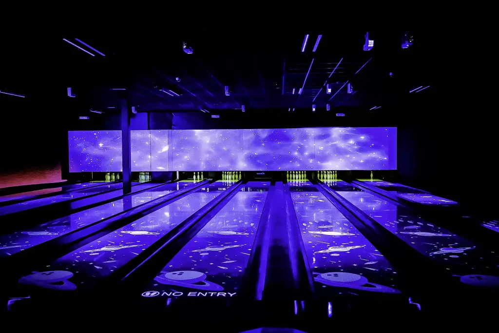 Next-Gen Bowling Lanes Installed In Entertainment Venue USBC-Certified Bowling System Close-up Discovery Bowl Lane With Immersive and Interactive Game Modes