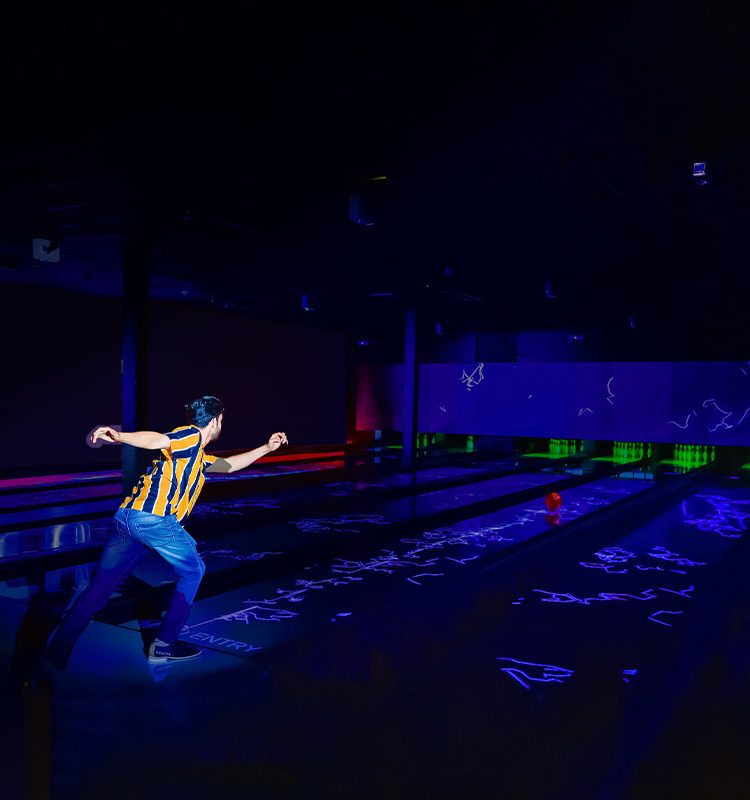 Next-Gen Bowling Lanes Installed In Entertainment Venue USBC-Certified Bowling System Close-up Discovery Bowl Lane With Immersive and Interactive Game Modes